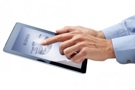 http://www.dreamstime.com/royalty-free-stock-photography-business-computer-ipad-tablet-hands-image27434137