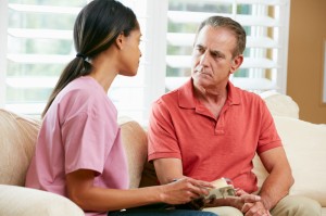 http://www.dreamstime.com/stock-photography-nurse-discussing-records-senior-male-patient-image29054352