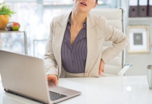 http://www.dreamstime.com/stock-photo-closeup-business-woman-back-pain-office-image42509180