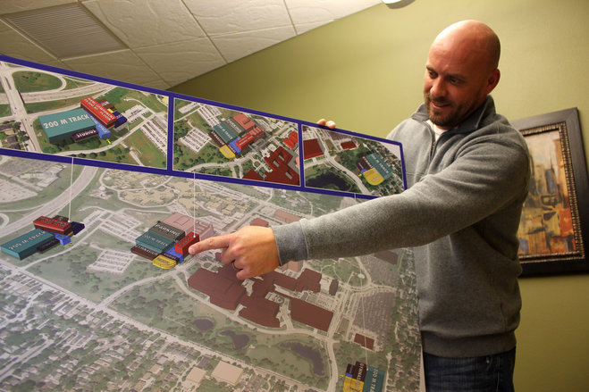 Damian Buchman points to a potential location of the proposed 200,000 square foot The Ability Center. (Photo courtesy of WauwatosaNow.com_